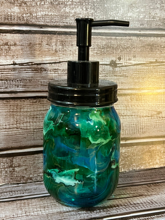 Green and blue soap dispenser